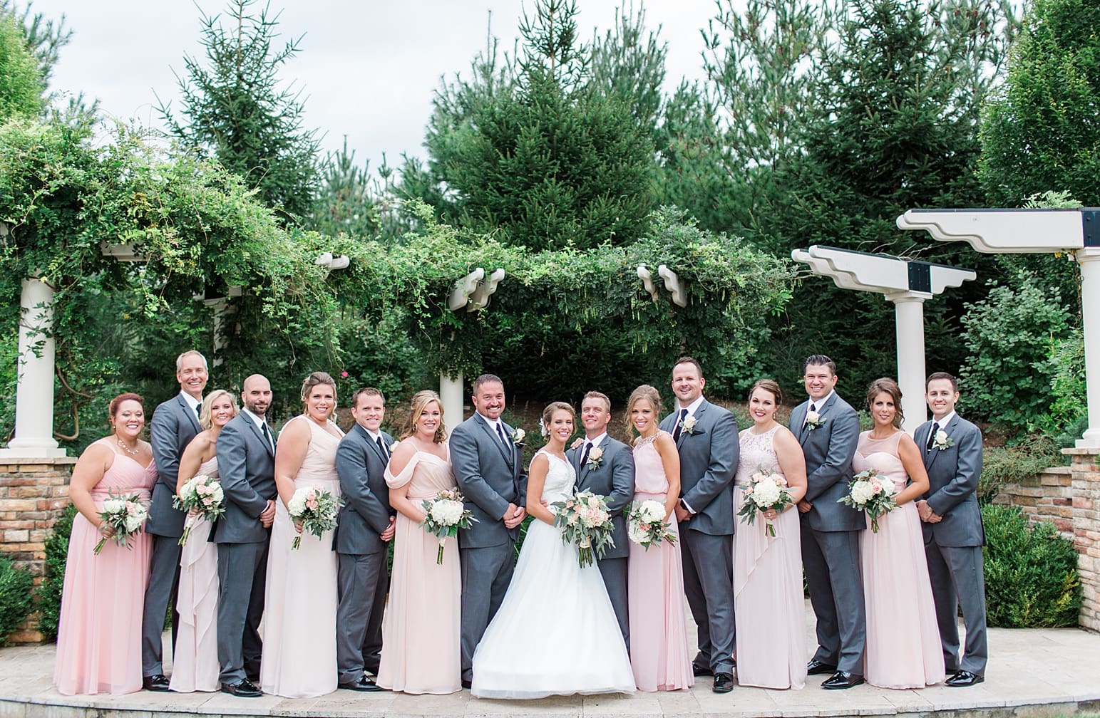 Arielle Peters Photography | Wedding party under pavilion on wedding day at The Pavilion at Sandy Pines in Demotte, Indiana.