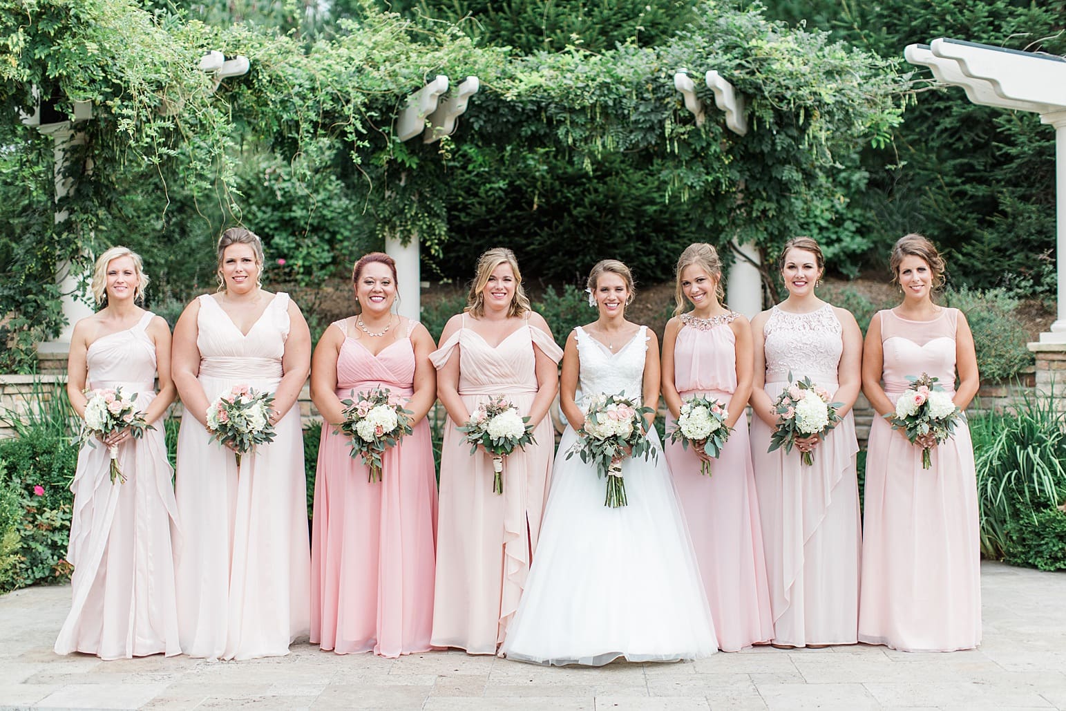 Arielle Peters Photography | Bride and bridesmaids under pavilion on wedding day at The Pavilion at Sandy Pines in Demotte, Indiana.