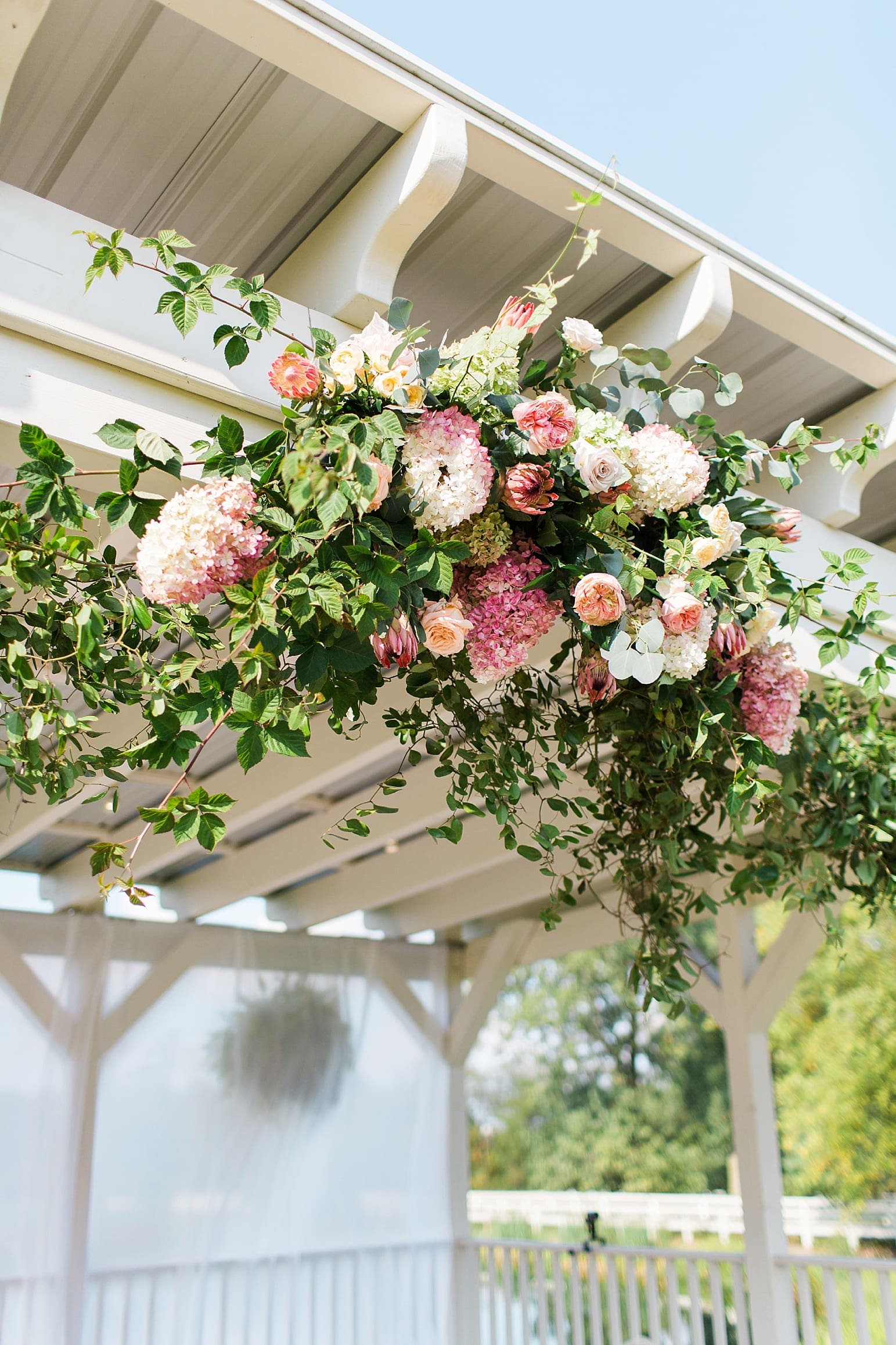 Arielle Peters Photography | Fall floral arrangements at outdoor wedding ceremony at Joseph Decuis Farm in Roanoke, Indiana.