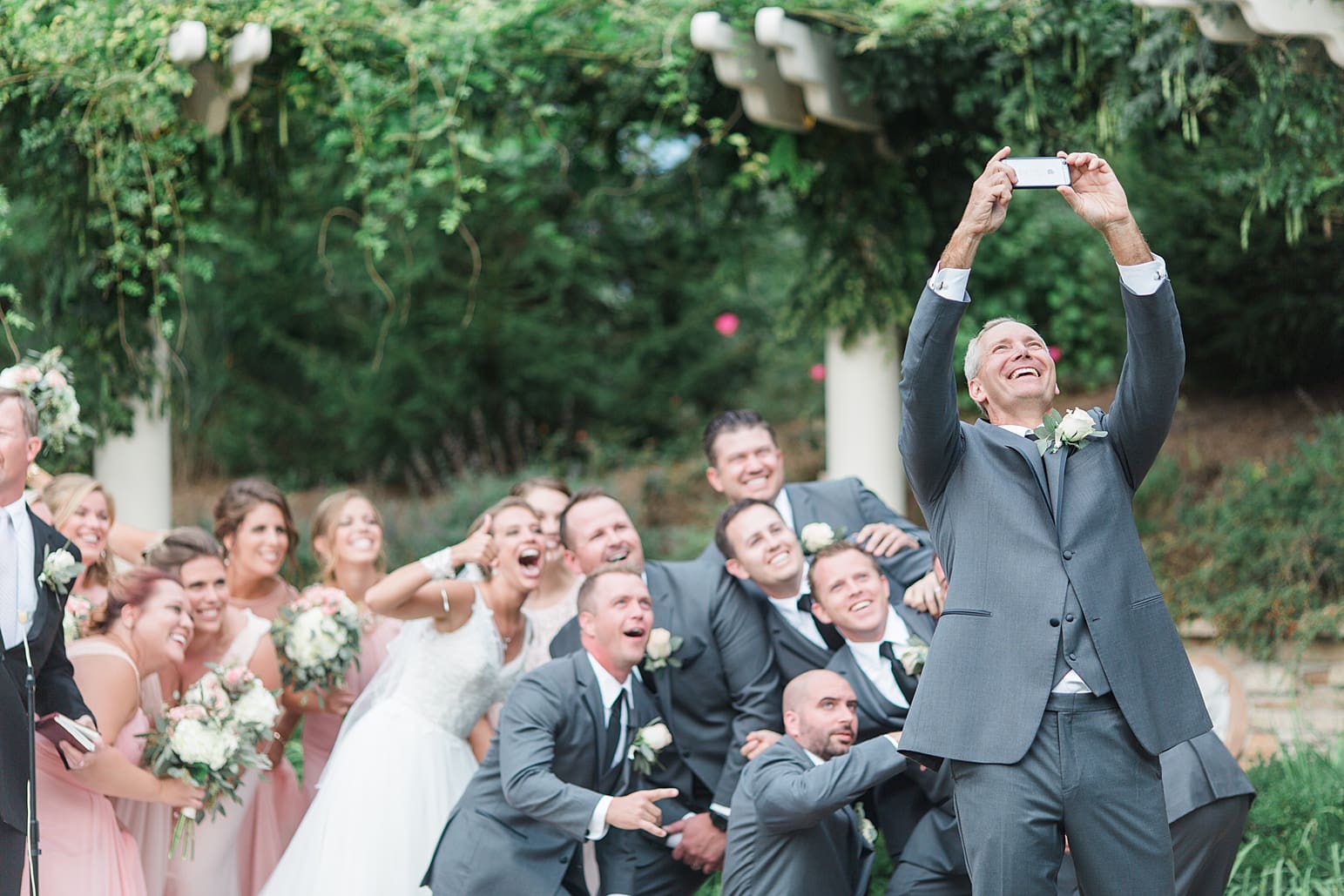 Arielle Peters Photography | Father of bride taking selfie on wedding day at The Pavilion at Sandy Pines in Demotte, Indiana.
