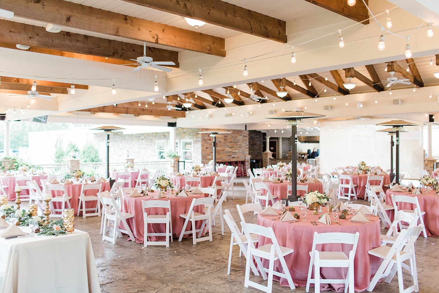 Arielle Peters Photography | Wedding reception table settings and floral arrangements on wedding day at The Pavilion at Sandy Pines in Demotte, Indiana.