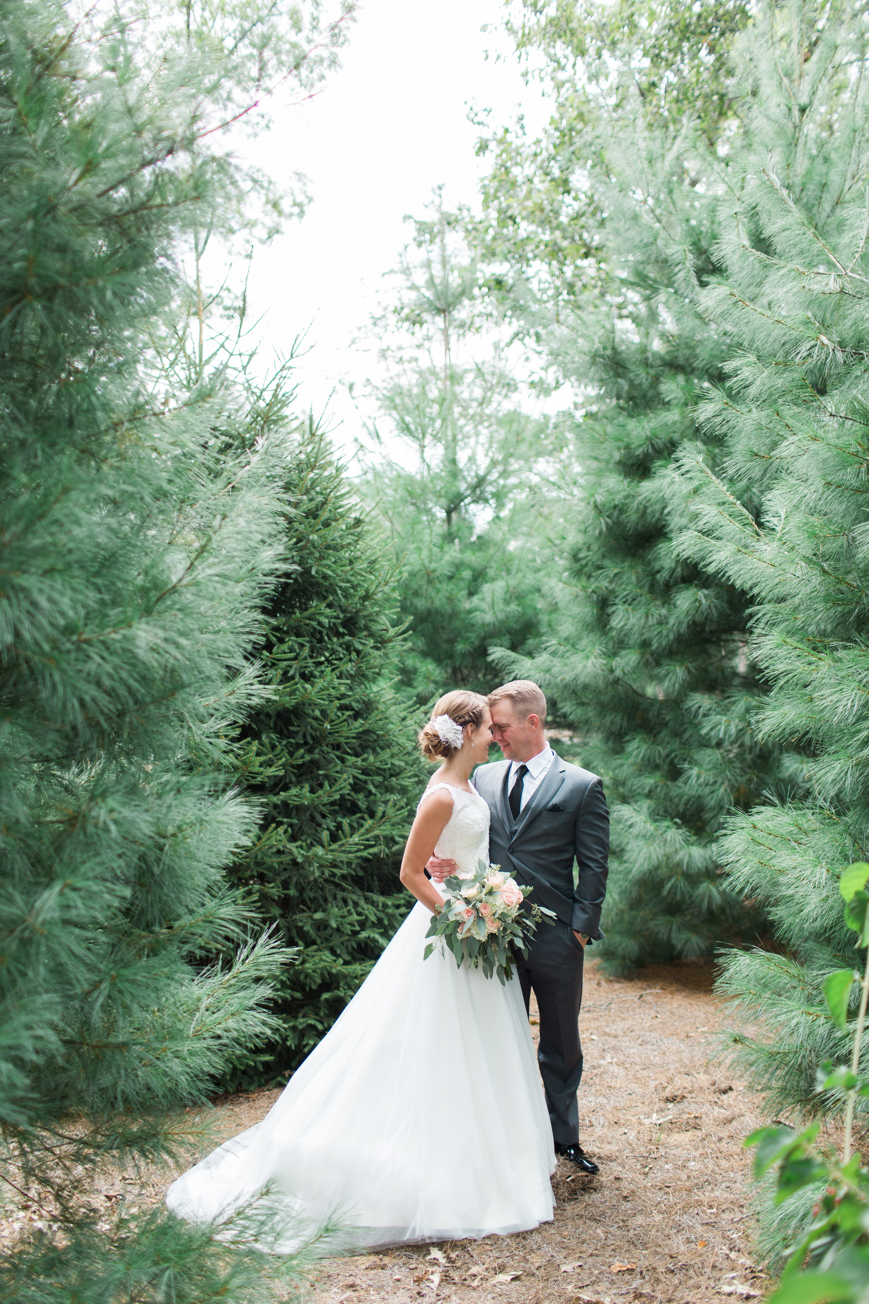 Arielle Peters Photography taking a couple’s wedding day photos at The Pavilion at Sandy Pines in Demotte, Indiana.