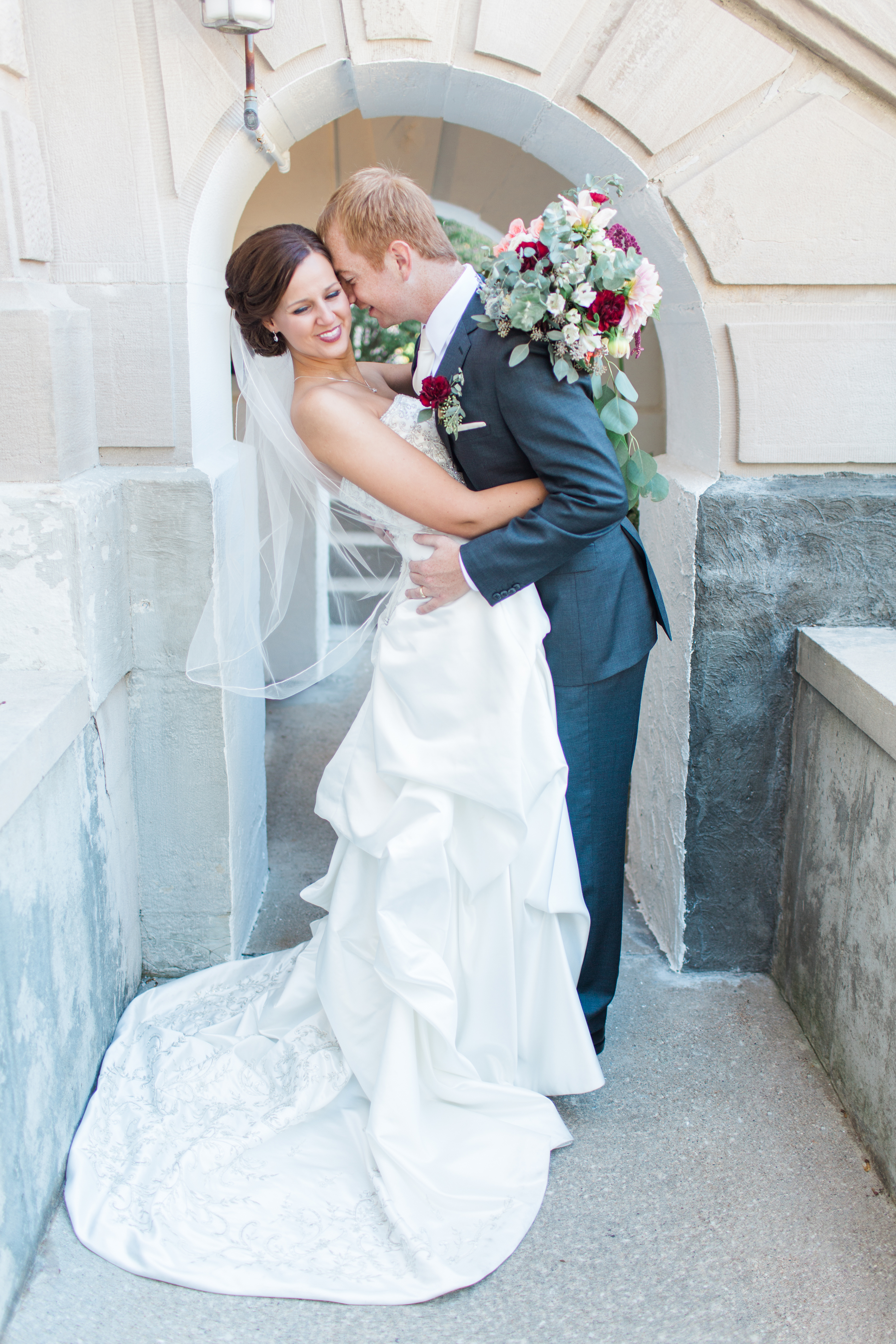 Arielle Peters Photography taking a couple’s wedding day photos in Winona Lake, Indiana.