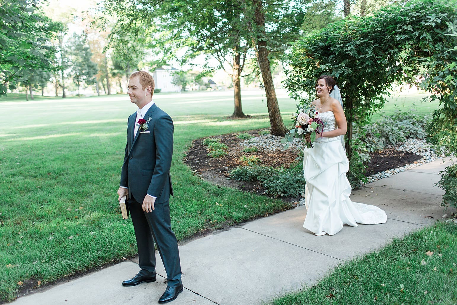 Arielle Peters Photography | Bride and groom having first reveal on fall wedding day in Winona Lake, Indiana.