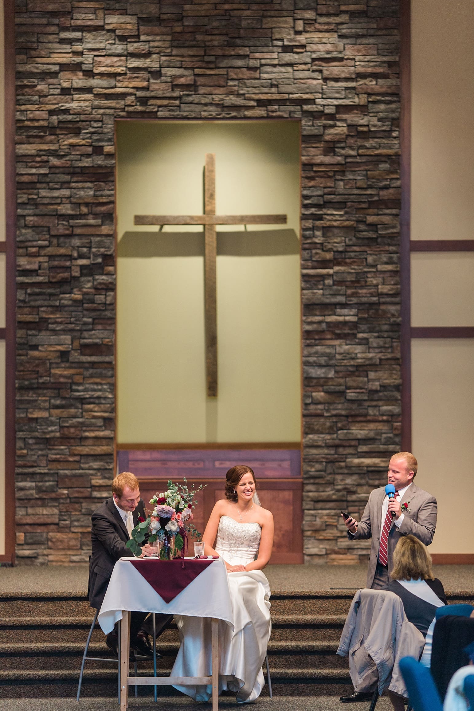 Arielle Peters Photography | Best man giving speech at wedding reception on fall wedding day in Winona Lake, Indiana.