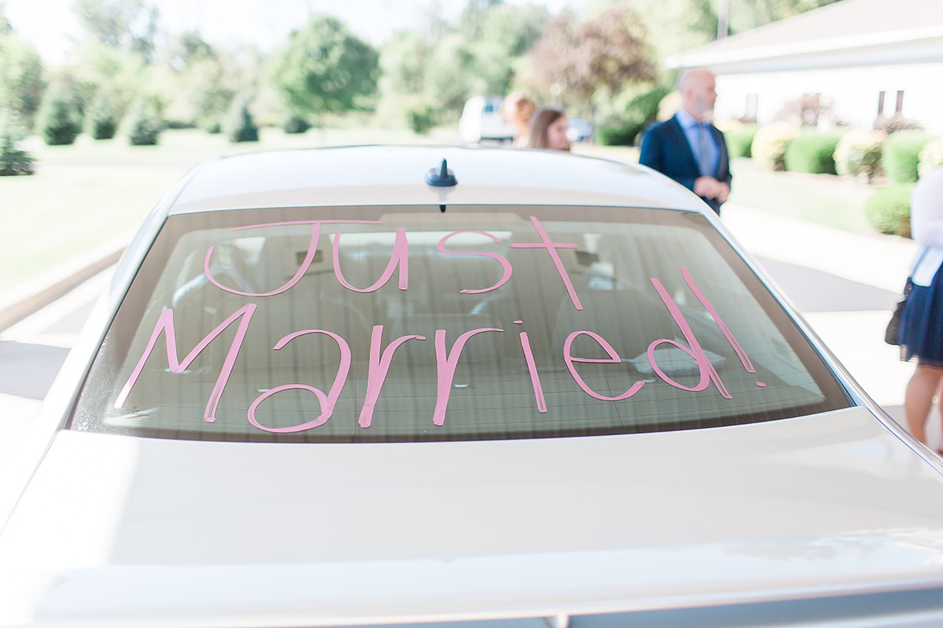 Arielle Peters Photography | "Just Married" car at wedding reception on fall wedding day in Winona Lake, Indiana.