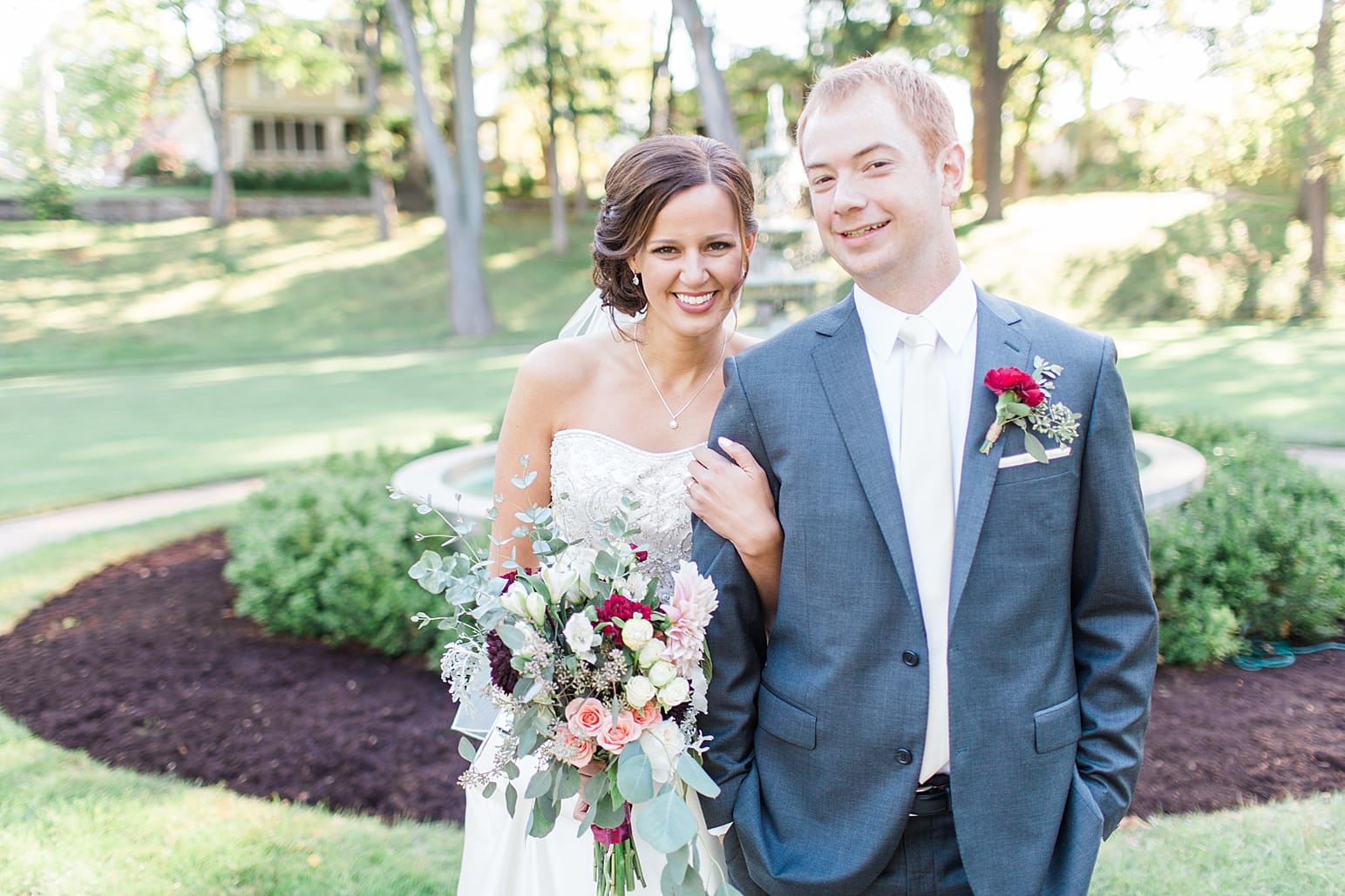 Arielle Peters Photography | Bride and groom walking in park on fall wedding day in Winona Lake, Indiana.