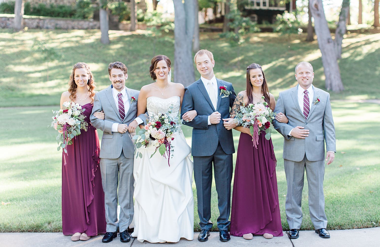 Arielle Peters Photography | Wedding party in park on fall wedding day in Winona Lake, Indiana.
