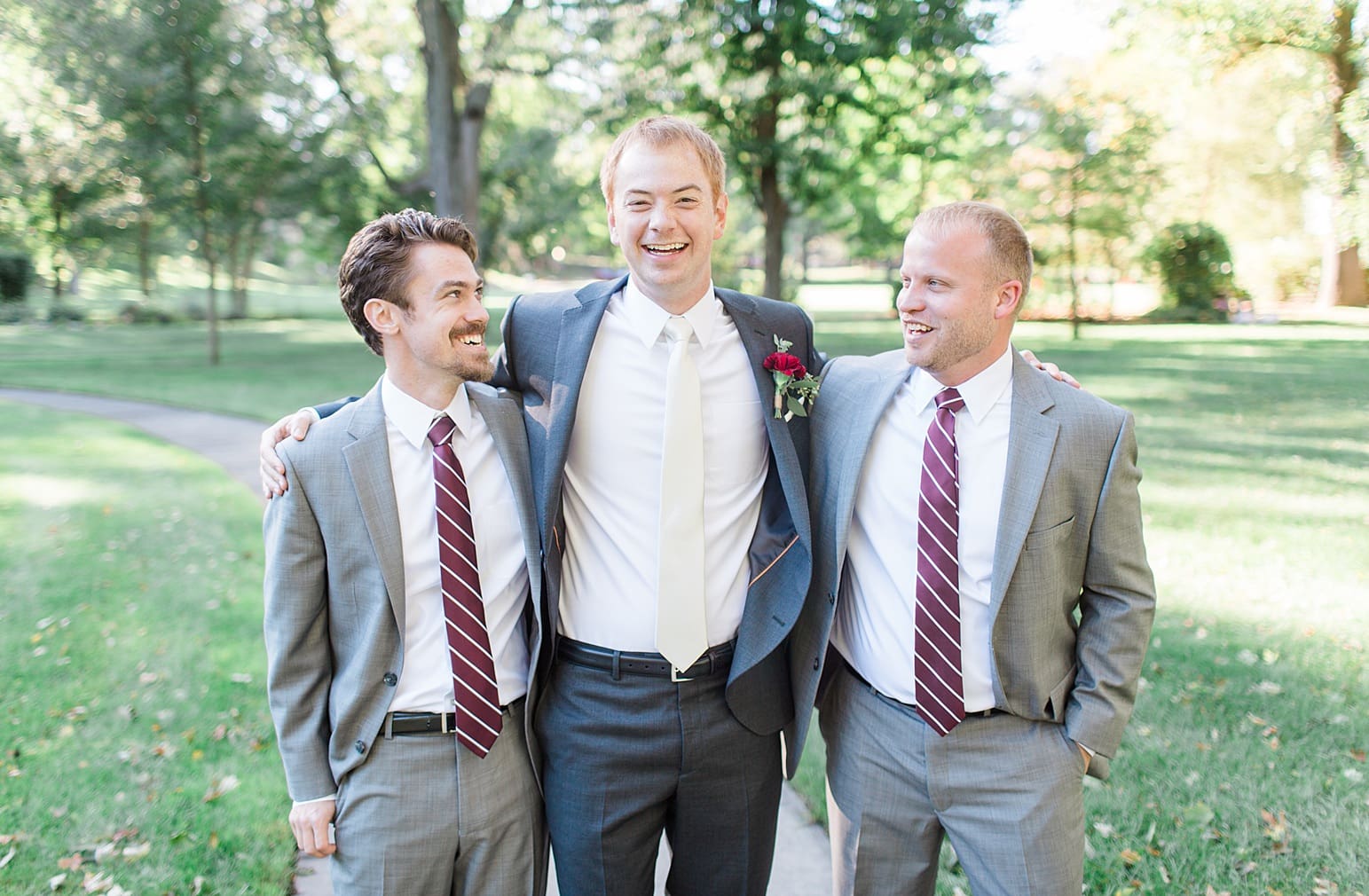 Arielle Peters Photography | Groom and groomsmen in park on fall wedding day in Winona Lake, Indiana.