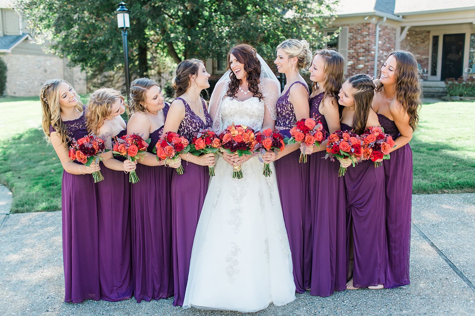 Arielle Peters Photography | Bride and bridesmaids on sidewalk on wedding day in Carmel, Indiana. 