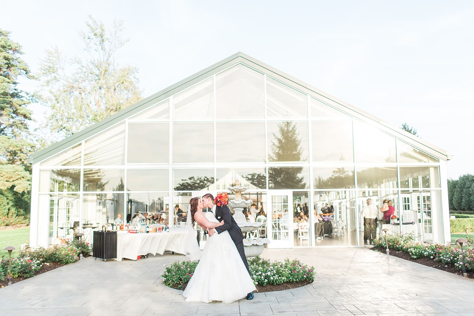 Arielle Peters Photography | Bride and groom kissing on wedding day at the Ritz Charles Garden Pavilion in Carmel, Indiana. 
