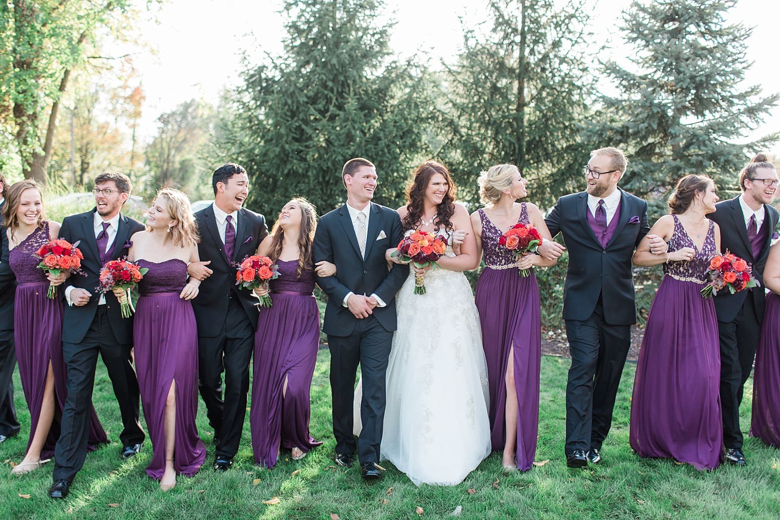 Arielle Peters Photography | Wedding party walking outside on wedding day at the Ritz Charles Garden Pavilion in Carmel, Indiana. 