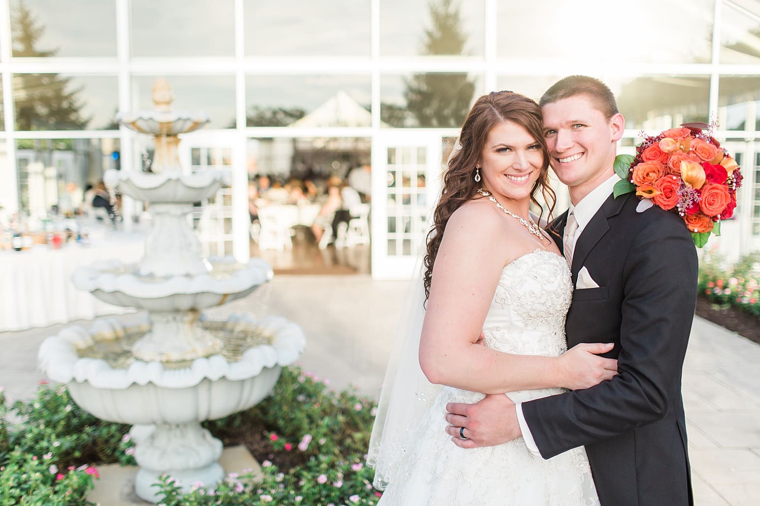 Arielle Peters Photography | Bride and groom in courtyard outside on wedding day at the Ritz Charles Garden Pavilion in Carmel, Indiana. 