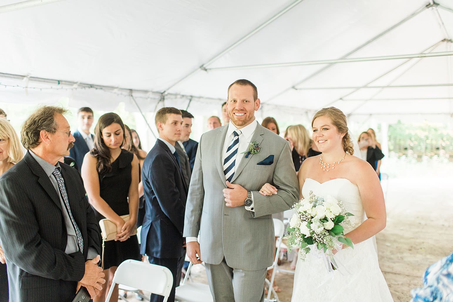 Arielle Peters Photography | Bride walking down the aisle on wedding day in Syracuse, Indiana.