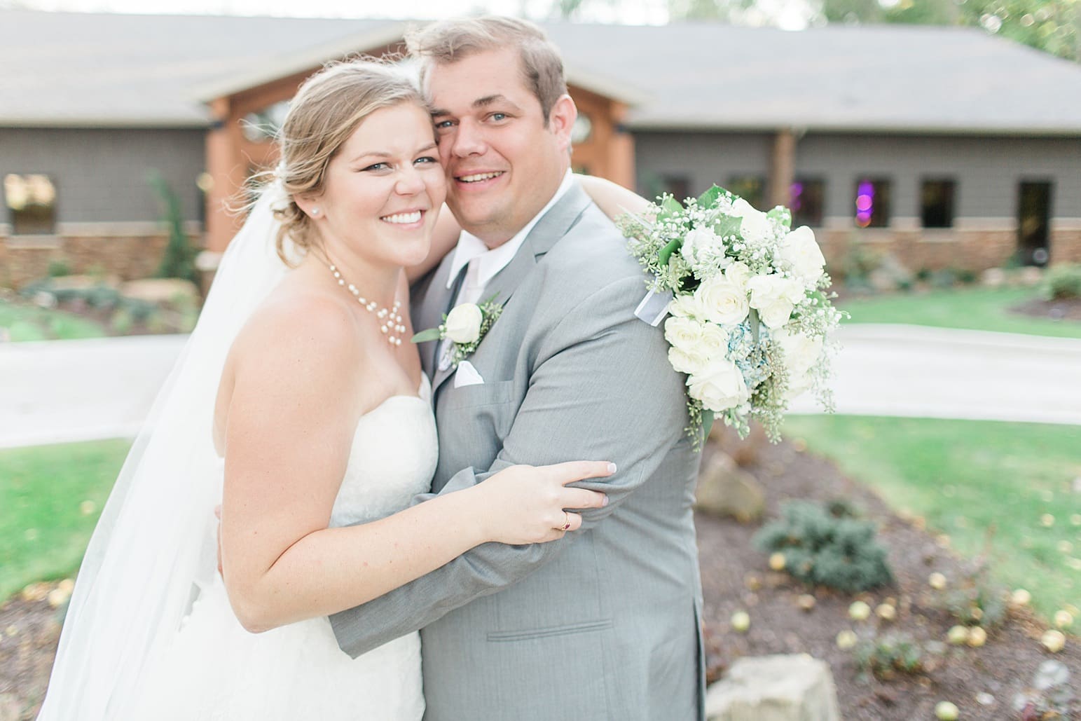 Arielle Peters Photography | Bride and groom outside on wedding day in Syracuse, Indiana.