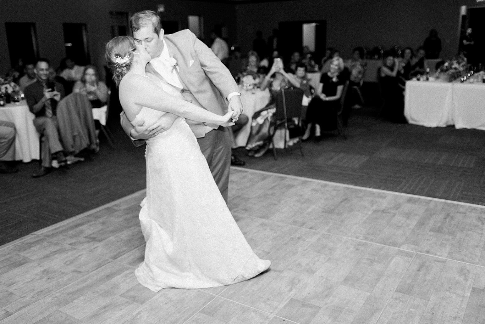 Arielle Peters Photography | Bride and groom sharing first dance on wedding day at Sleepy Owl Restaurant in Syracuse, Indiana.