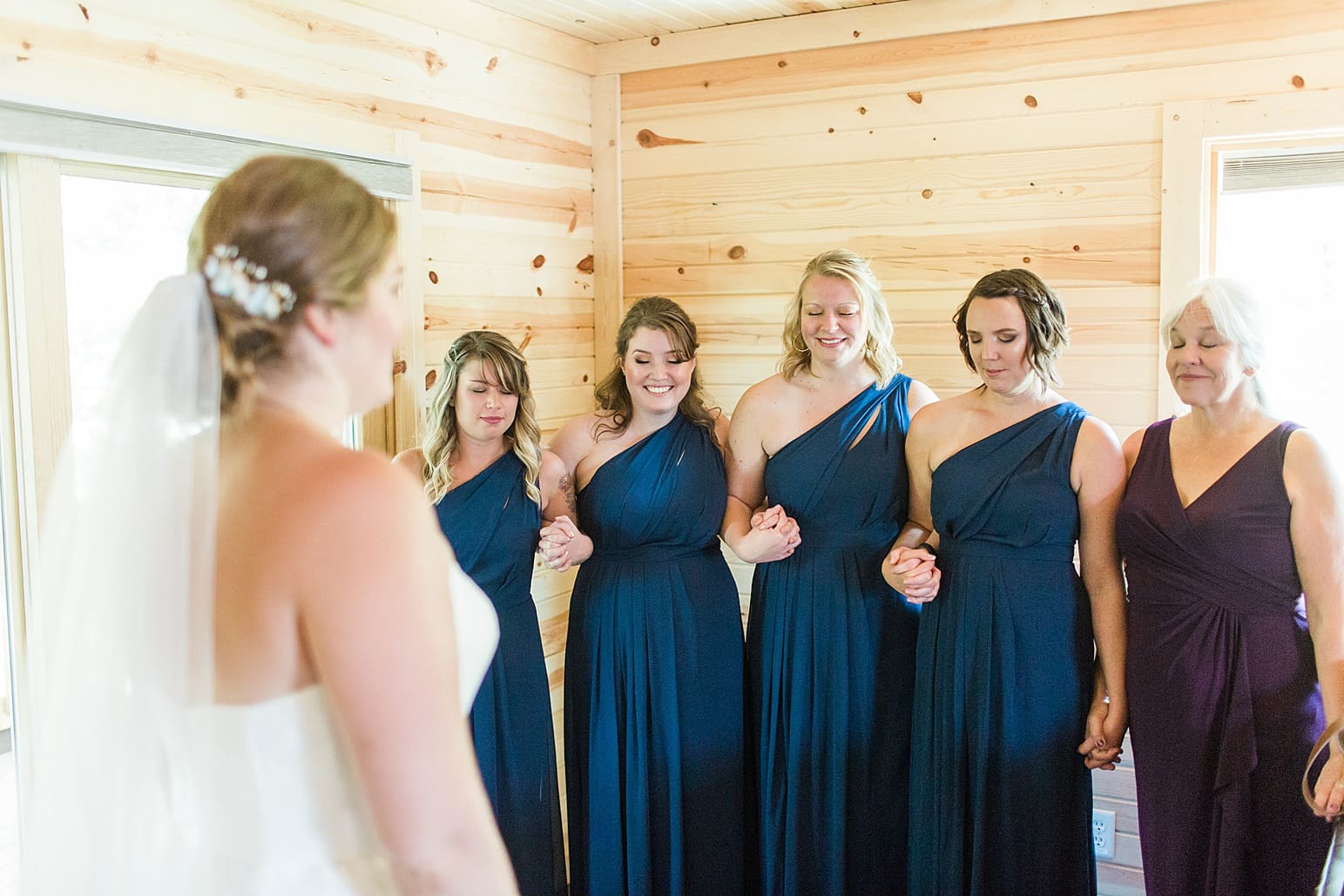 Arielle Peters Photography | Bride and bridesmaids having first reveal on wedding day in Syracuse, Indiana.