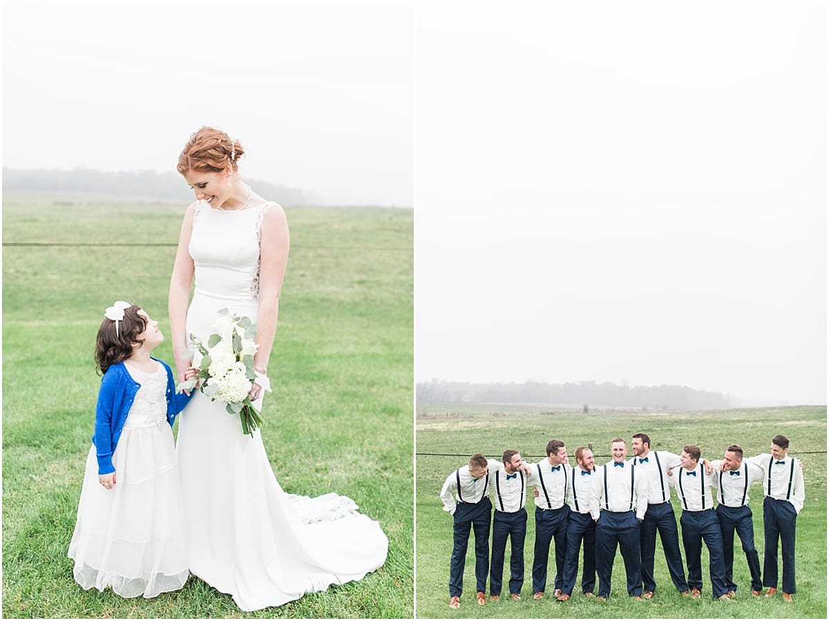 Arielle Peters Photography | Bride and flower girl holding hands in open green field on gloomy wedding day in Huntington, Indiana.