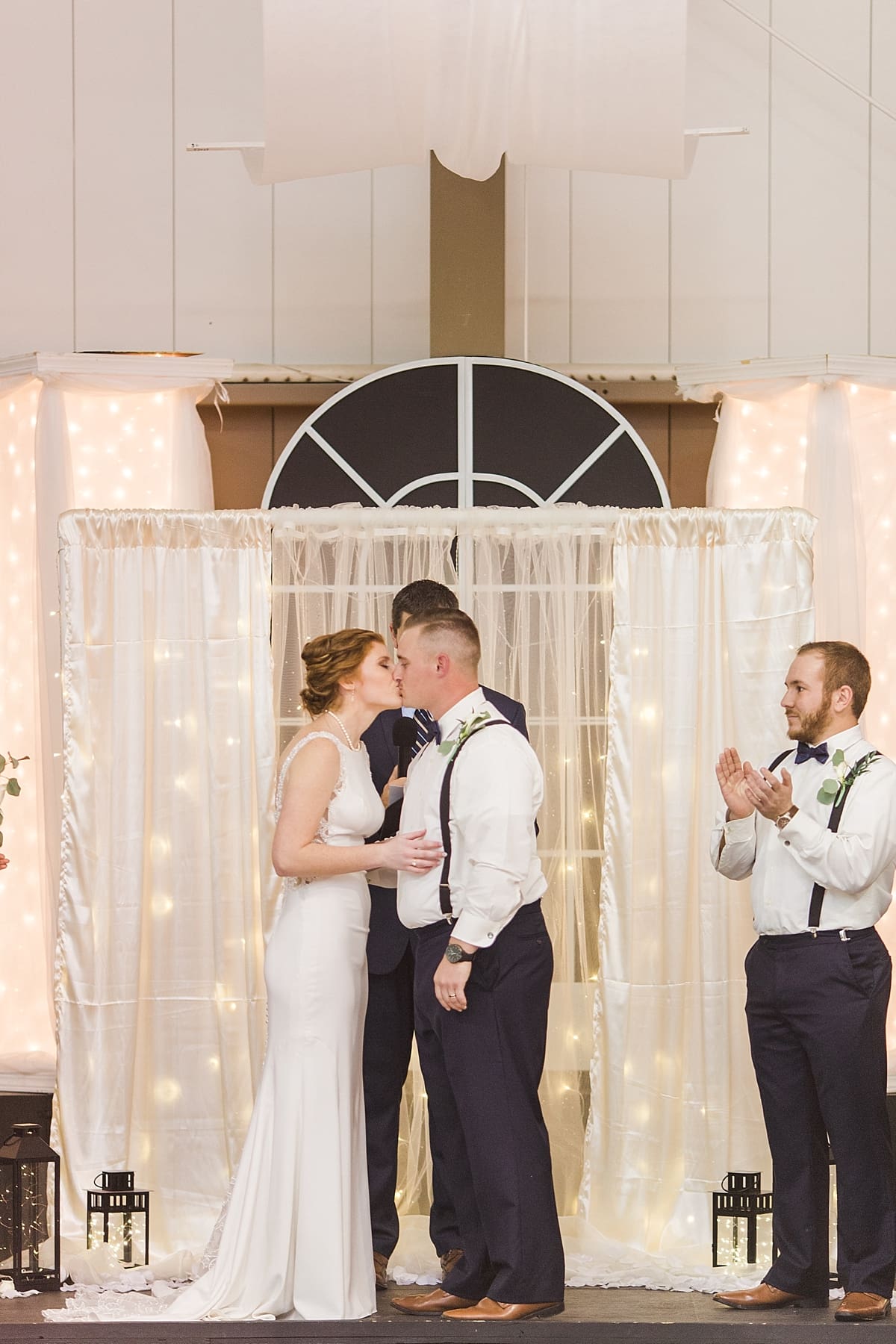 Arielle Peters Photography | Bride and groom kissing at the alter on wedding day in Huntington, Indiana.