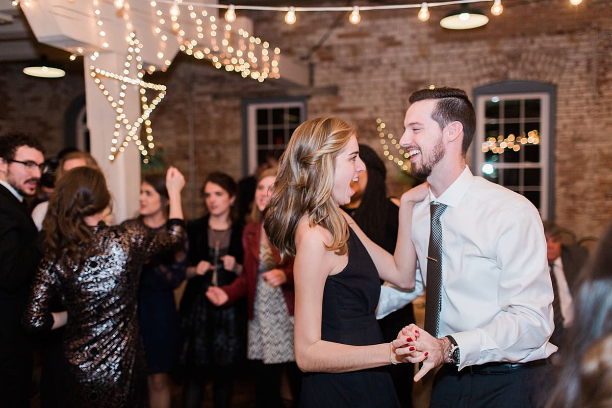 Arielle Peters Photography | Wedding guests dancing at wedding reception on winter wedding day in Goshen, Indiana.