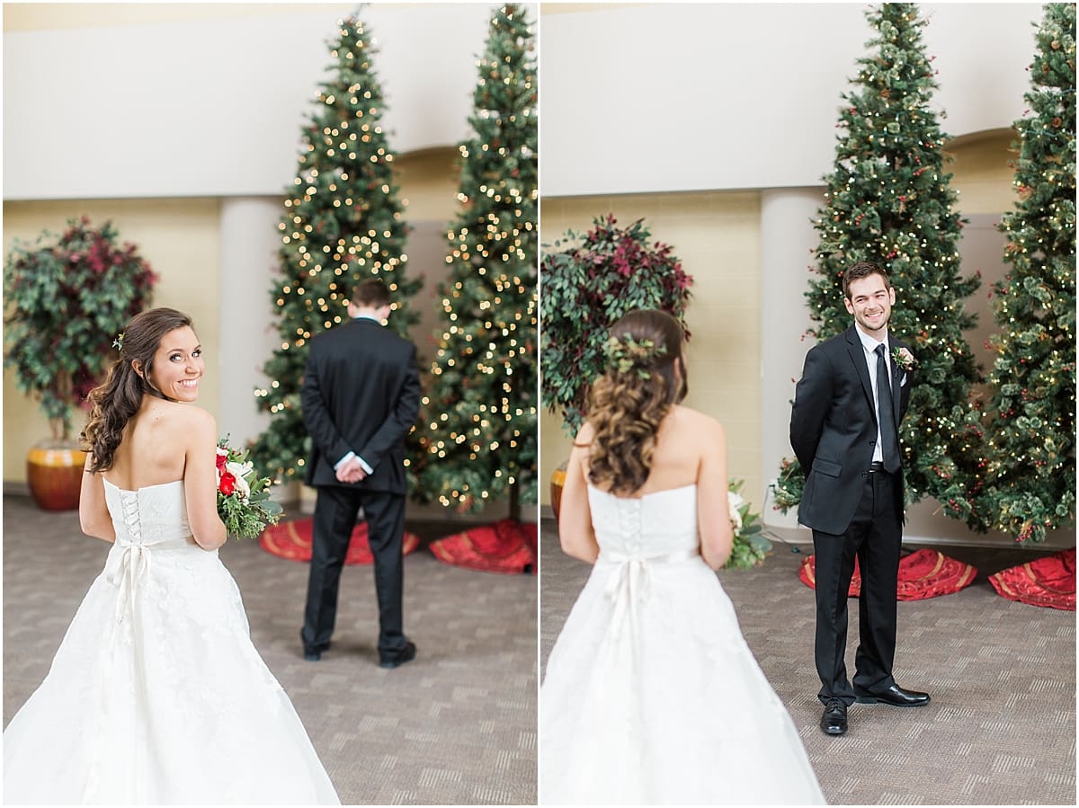 Arielle Peters Photography | Bride and groom having first reveal next to Christmas trees on winter wedding day in Goshen, Indiana.