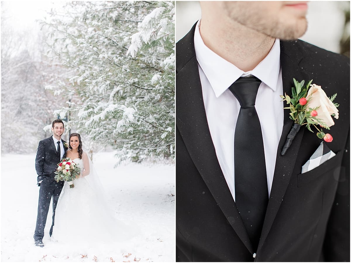 Arielle Peters Photography | Bride and groom in the snow under large pine trees on winter wedding day in Goshen, Indiana.