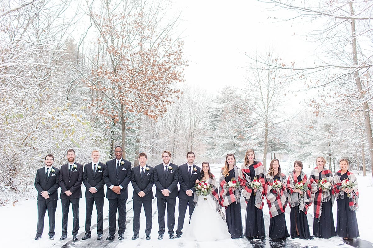 Arielle Peters Photography | Wedding party outside in snow on winter wedding day in Goshen, Indiana.