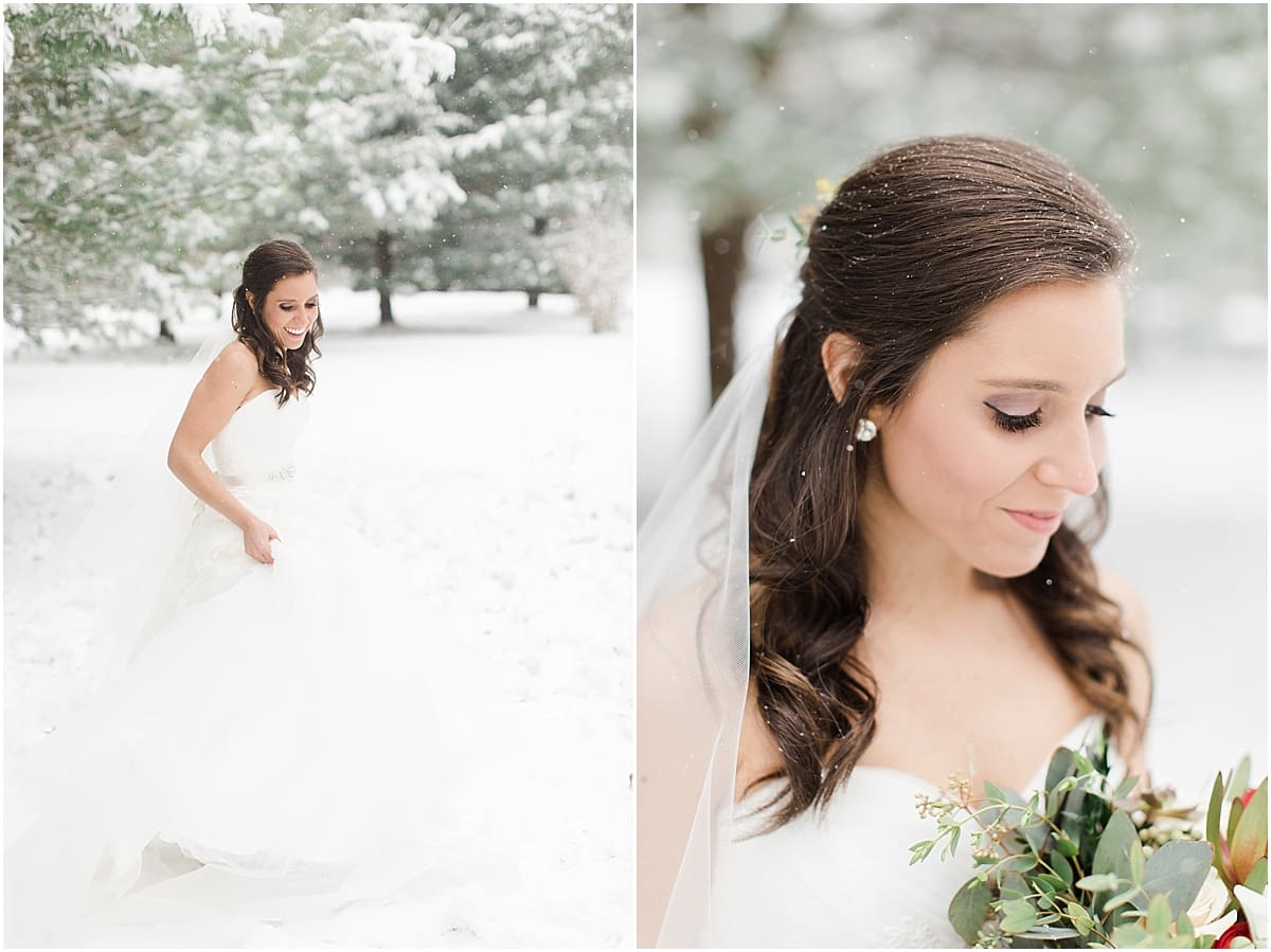 Arielle Peters Photography | Bride walking in the snow under large pine trees on winter wedding day in Goshen, Indiana.