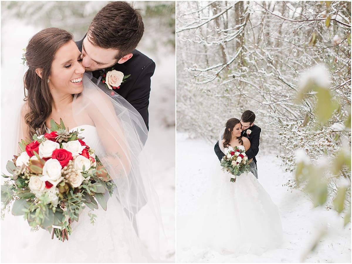 Arielle Peters Photography | Bride and groom kissing in the snow under large pine trees on winter wedding day in Goshen, Indiana.