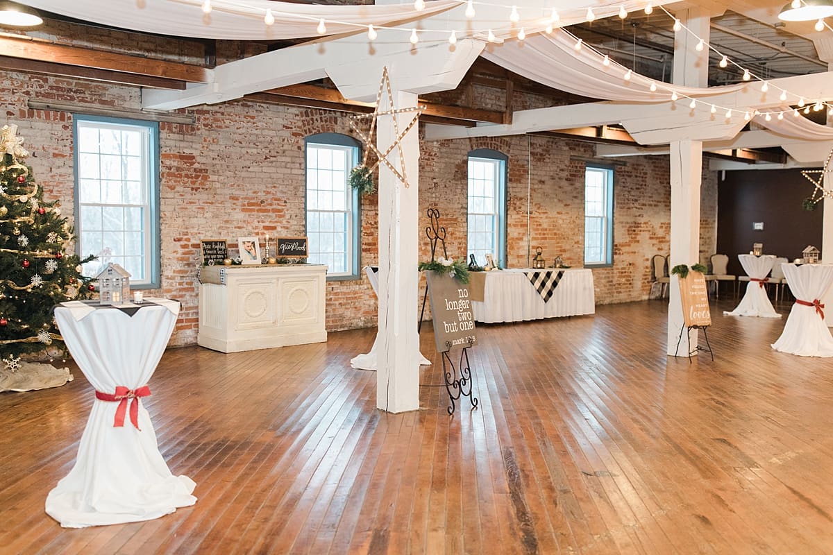 Arielle Peters Photography | Winter wedding reception table settings and floral arrangements on winter wedding day in Goshen, Indiana.