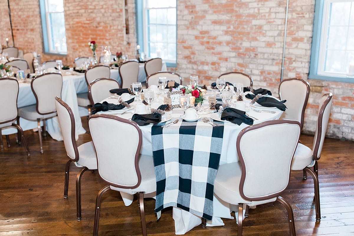 Arielle Peters Photography | Winter wedding reception table settings and floral arrangements on winter wedding day in Goshen, Indiana.