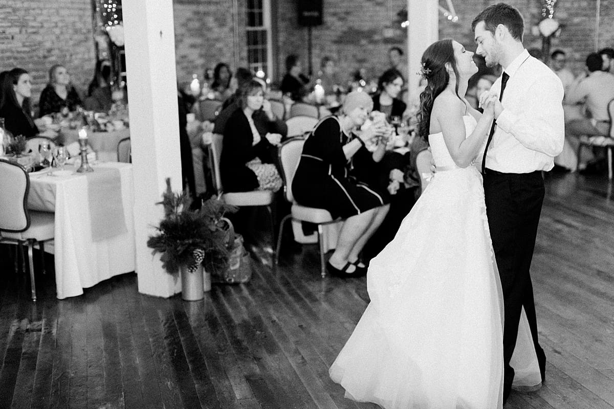 Arielle Peters Photography | Bride and groom sharing first dance at wedding reception on winter wedding day in Goshen, Indiana.