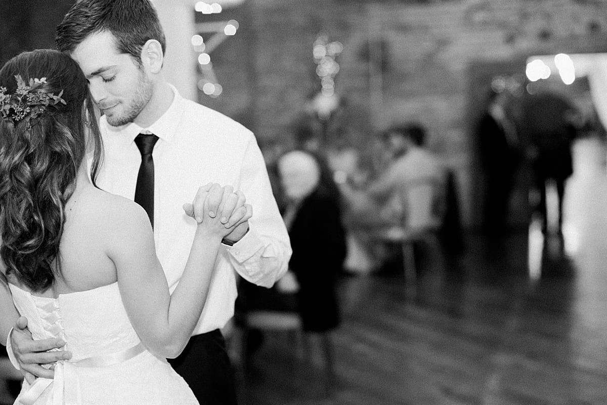Arielle Peters Photography | Bride and groom sharing first dance at wedding reception on winter wedding day in Goshen, Indiana.
