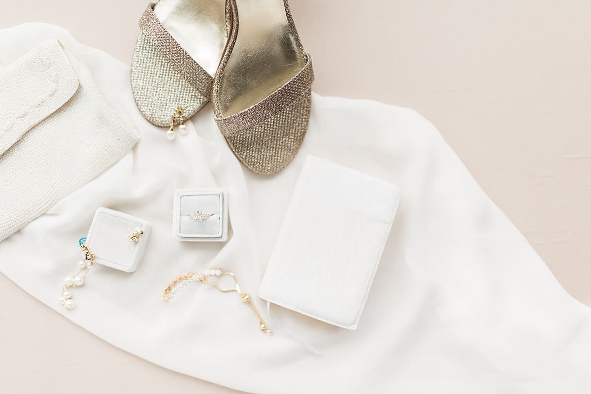 Arielle Peters Photography | Bride's shoes and jewelry on wedding day inside the Basilica of the Sacred Heart in Notre Dame, Indiana.
