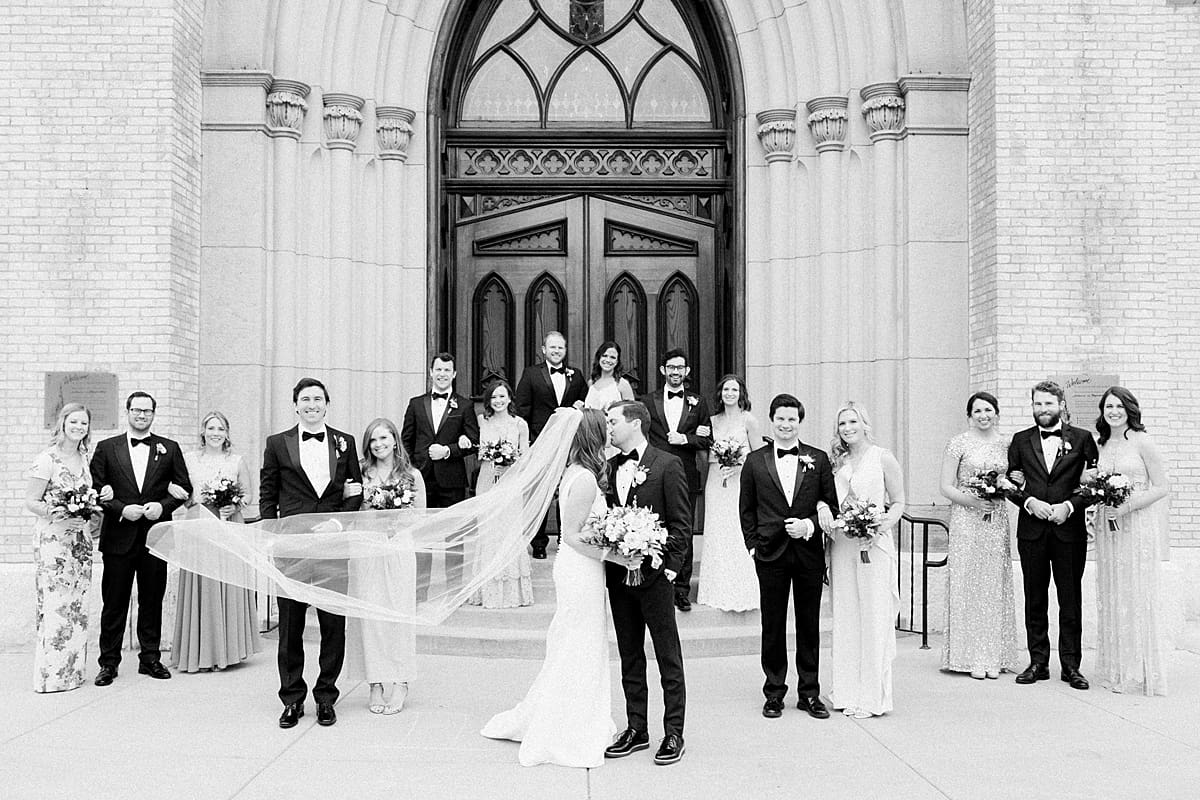 Arielle Peters Photography | Wedding party outside cathedral doors on wedding day at the Basilica of the Sacred Heart in Notre Dame, Indiana.
