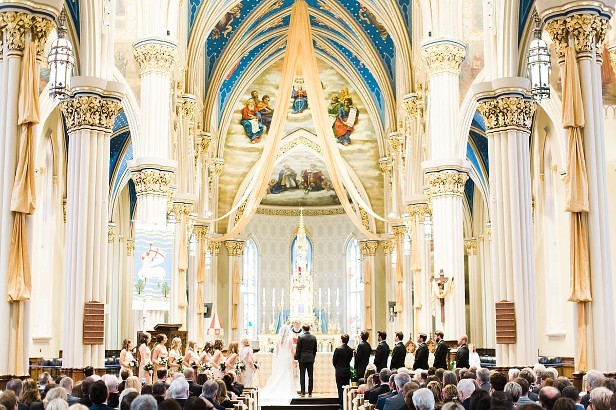 Arielle Peters Photography | Father of bride walking bride down aisle inside cathedral on wedding day at the Basilica of the Sacred Heart in Notre Dame, Indiana.