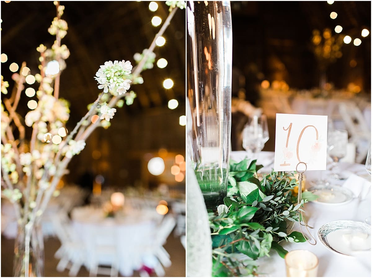 Arielle Peters Photography | Barn wedding reception table settings and floral arrangements on wedding day at St. Joseph's Farm in Granger, Indiana.