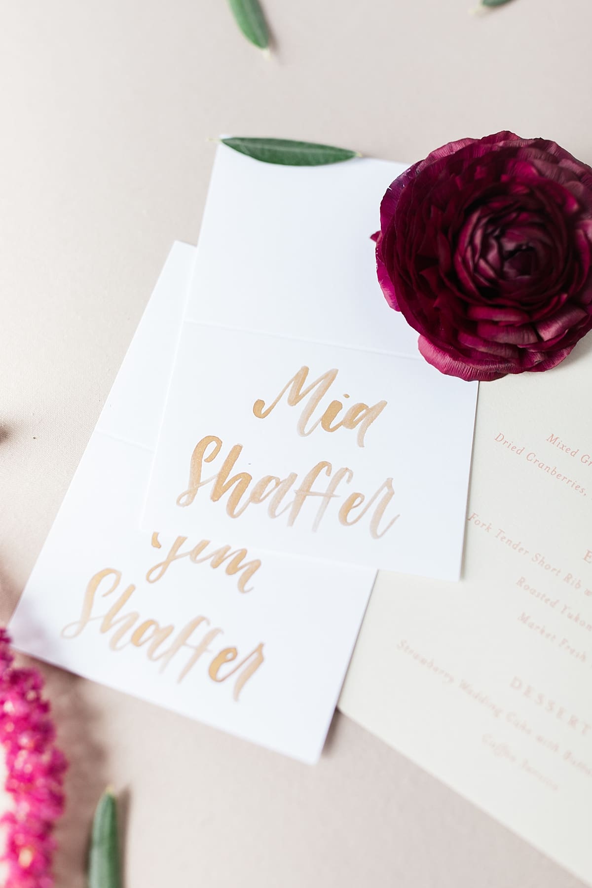 Arielle Peters Photography | Barn wedding reception table settings and floral arrangements on wedding day at St. Joseph's Farm in Granger, Indiana.