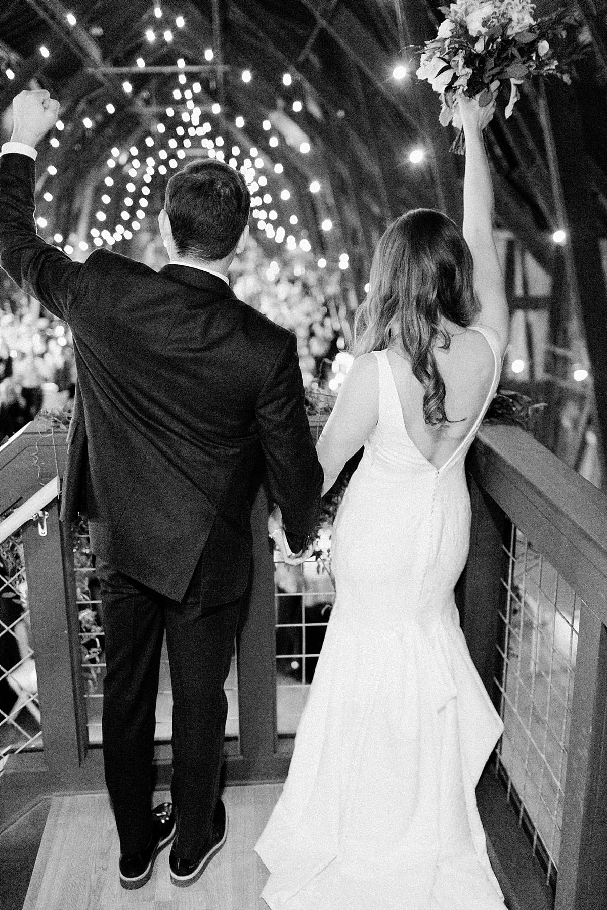 Arielle Peters Photography | Bride and groom entering wedding reception on wedding day at St. Joseph's Farm in Granger, Indiana.