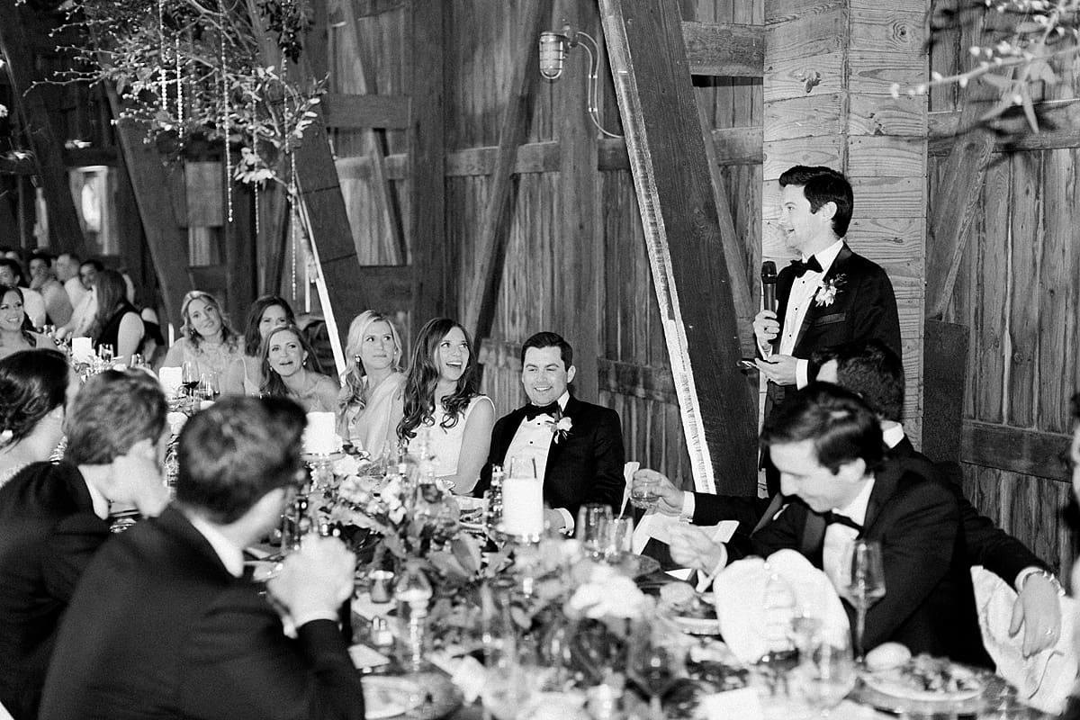  Arielle Peters Photography | Best man giving speech at wedding reception on wedding day at St. Joseph's Farm in Granger, Indiana.