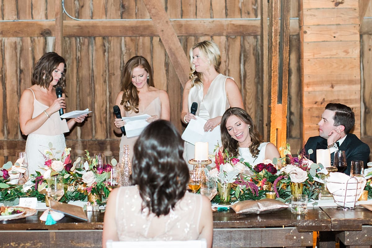  Arielle Peters Photography | Matrons of honor giving speech at wedding reception on wedding day at St. Joseph's Farm in Granger, Indiana.