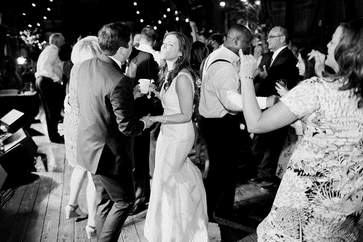  Arielle Peters Photography | Bride and groom dancing at wedding reception on wedding day at St. Joseph's Farm in Granger, Indiana.