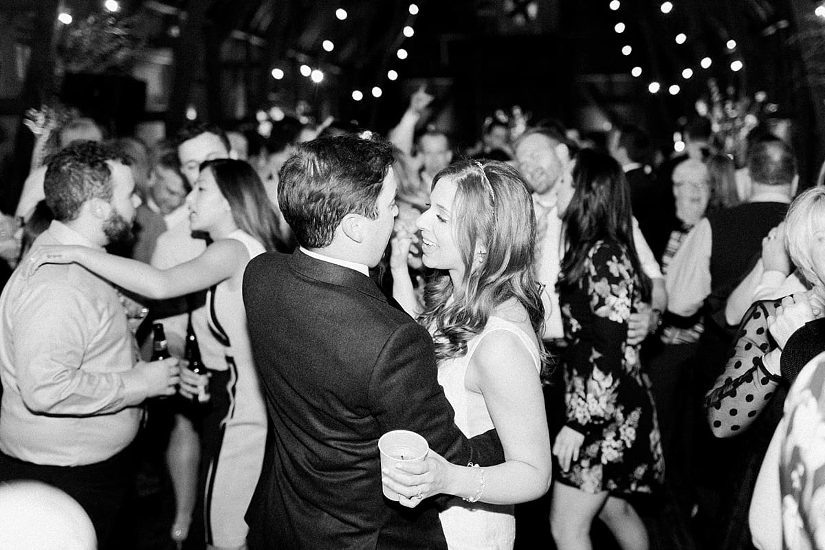  Arielle Peters Photography | Bride and groom dancing at wedding reception on wedding day at St. Joseph's Farm in Granger, Indiana.