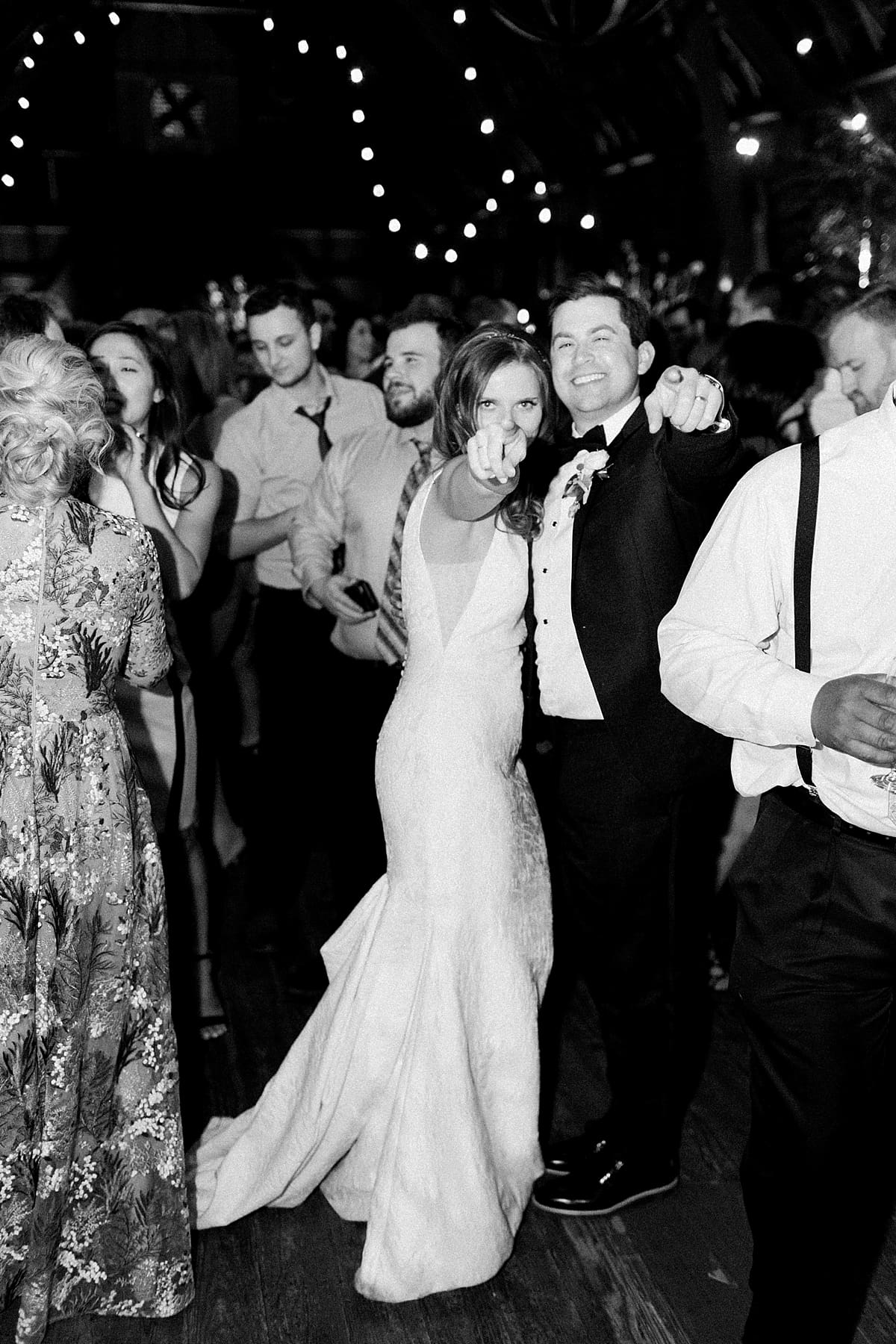  Arielle Peters Photography | Bride and groom dancing at wedding reception on wedding day at St. Joseph's Farm in Granger, Indiana.