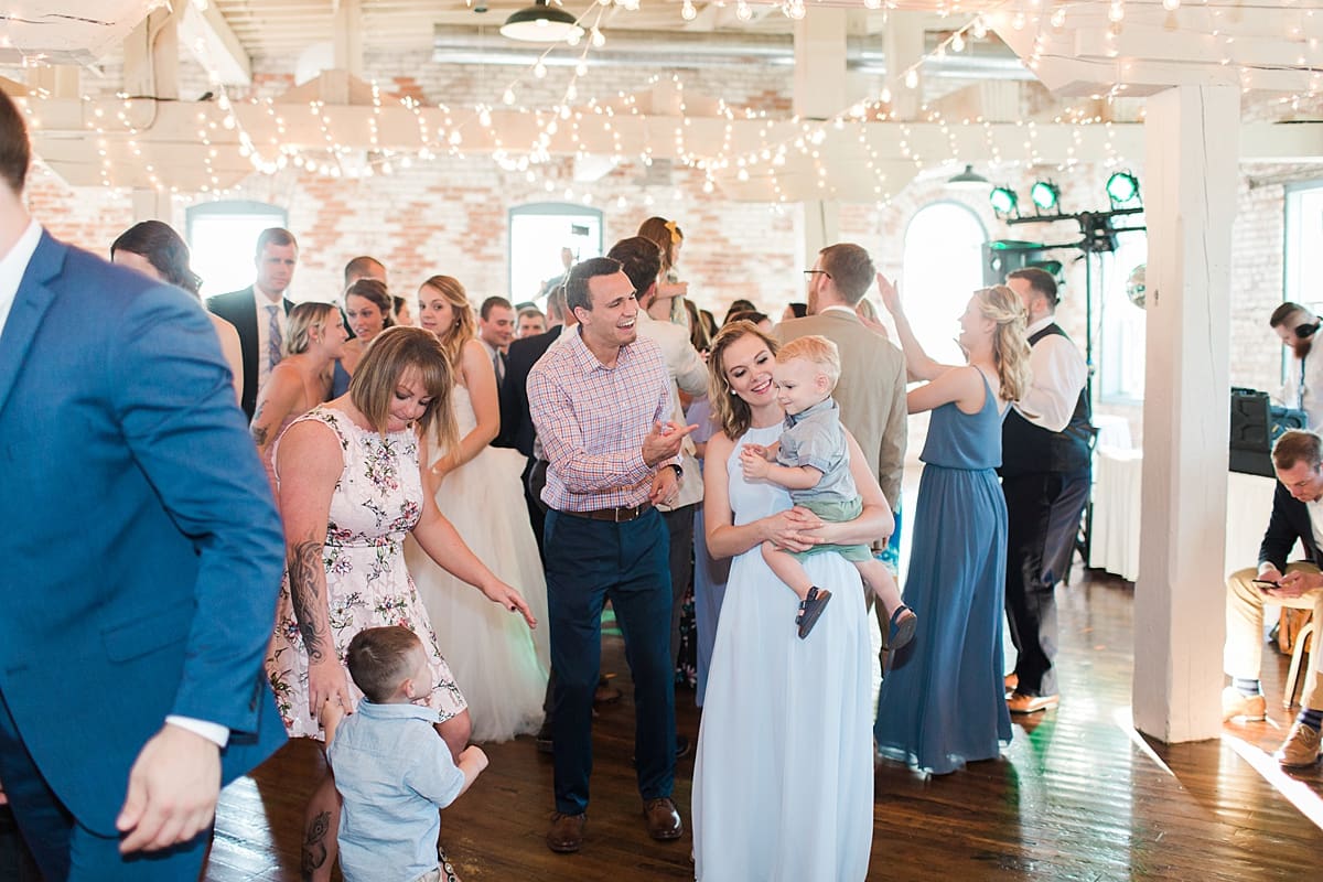 Arielle Peters Photography | Wedding guests dancing at wedding reception on wedding day at Bread & Chocolate in Goshen, Indiana.