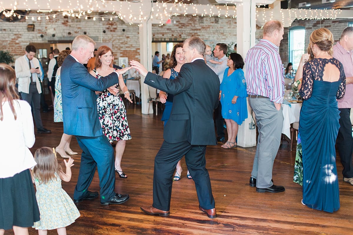 Arielle Peters Photography | Wedding guests dancing at wedding reception on wedding day at Bread & Chocolate in Goshen, Indiana.