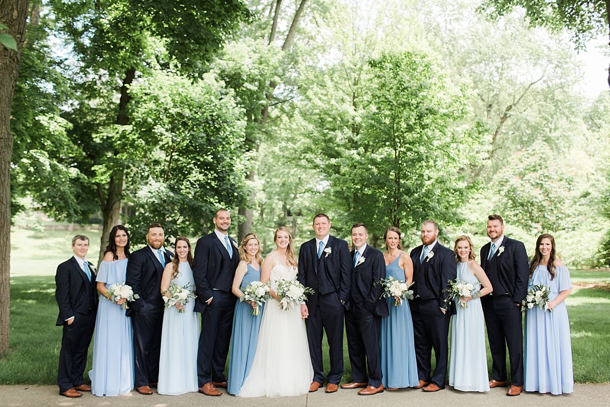 Arielle Peters Photography | Wedding party under large trees on wedding day in Winona Lake, Indiana. 