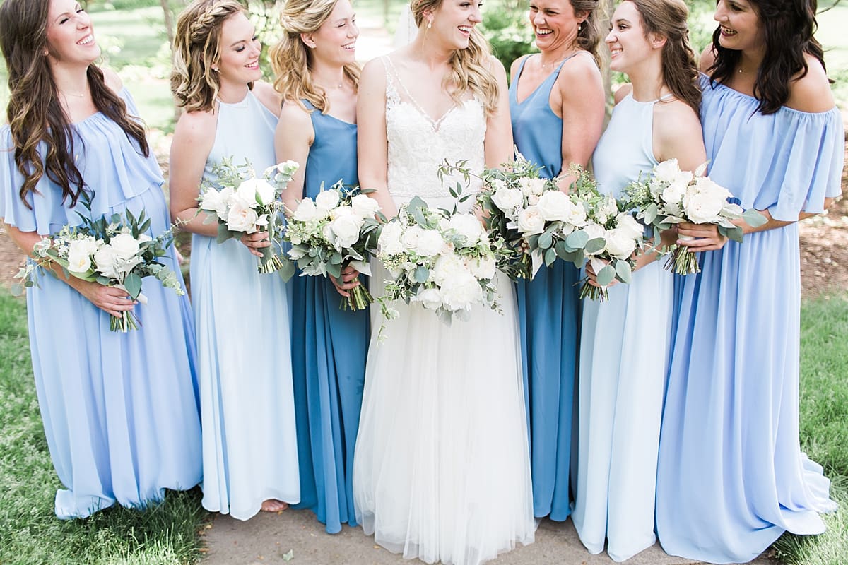 Arielle Peters Photography | Bride and bridesmaids under large trees at home on wedding day in Winona Lake, Indiana. 
