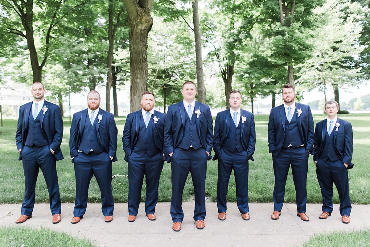 Arielle Peters Photography | Groom and groomsmen under large trees at home on wedding day in Winona Lake, Indiana. 
