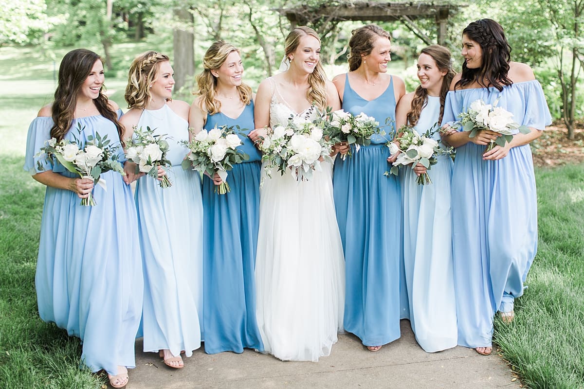 Arielle Peters Photography | Bride and bridesmaids under large trees at home on wedding day in Winona Lake, Indiana. 